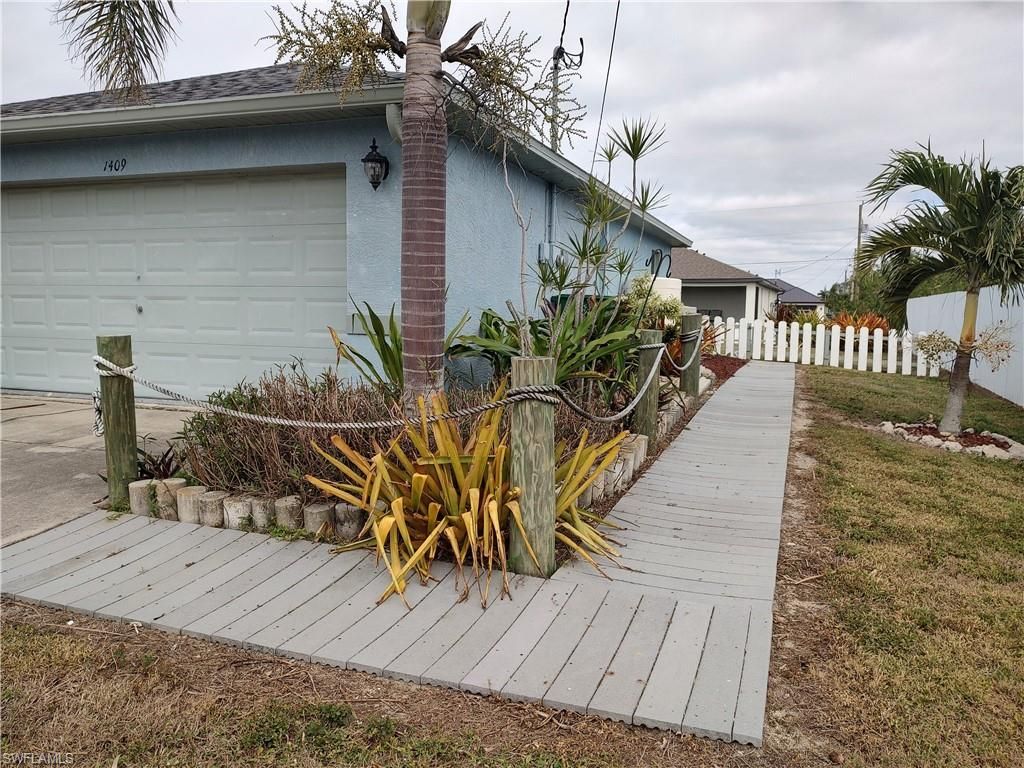 1409 NW 9th TER, CAPE CORAL, FL 33993 — photo 3