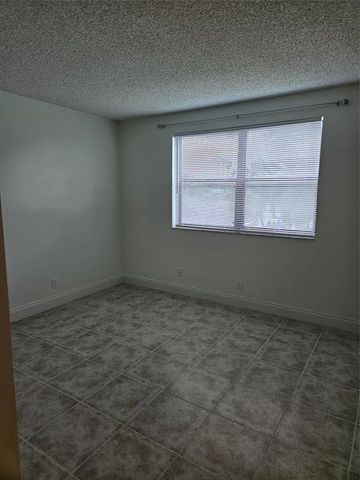 11453 NW 39th Ct 211, Coral Springs, FL 33065