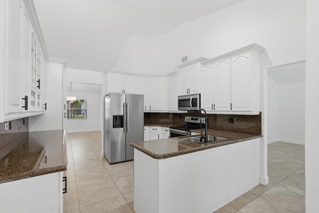 9033 NW 47th Court, Coral Springs, FL 33067