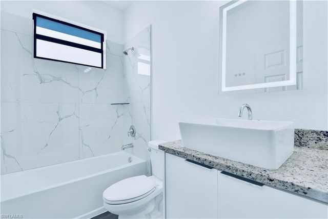 352 Rawlings AVE, Lehigh Acres, FL 33974