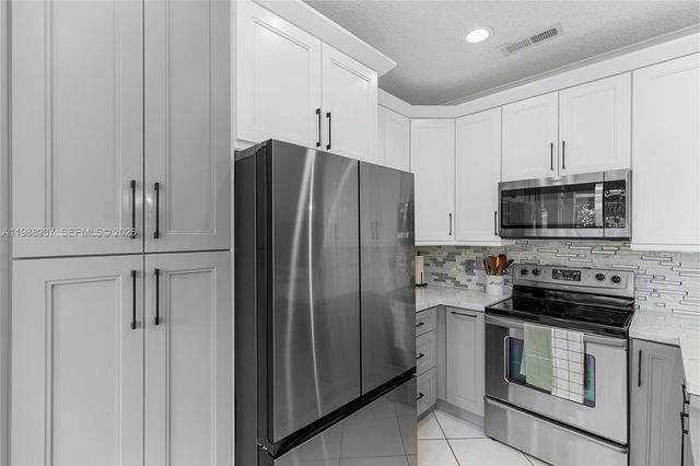 11435 NW 48th Ct, Coral Springs, FL 33076