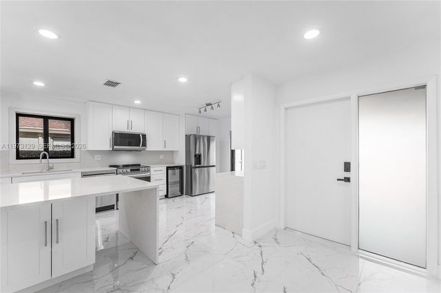 2007 Deer Creek Woodlands Way, Deerfield Beach, FL 33442