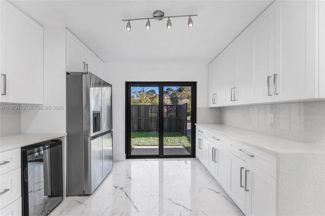 2007 Deer Creek Woodlands Way, Deerfield Beach, FL 33442