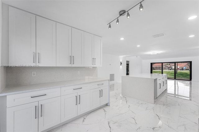 2007 Deer Creek Woodlands Way, Deerfield Beach, FL 33442