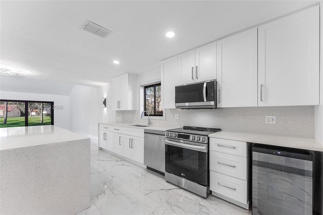 2007 Deer Creek Woodlands Way, Deerfield Beach, FL 33442