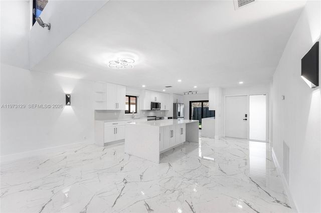 2007 Deer Creek Woodlands Way, Deerfield Beach, FL 33442