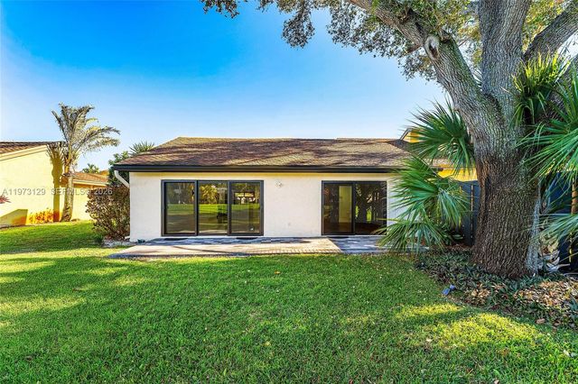 2007 Deer Creek Woodlands Way, Deerfield Beach, FL 33442