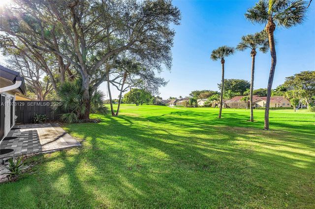 2007 Deer Creek Woodlands Way, Deerfield Beach, FL 33442