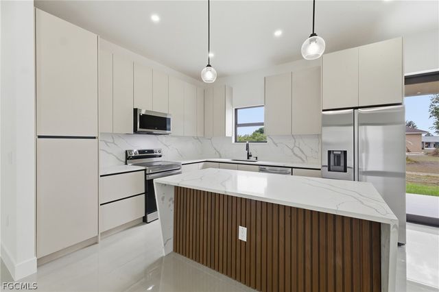 3211 6th ST SW, Lehigh Acres, FL 33976