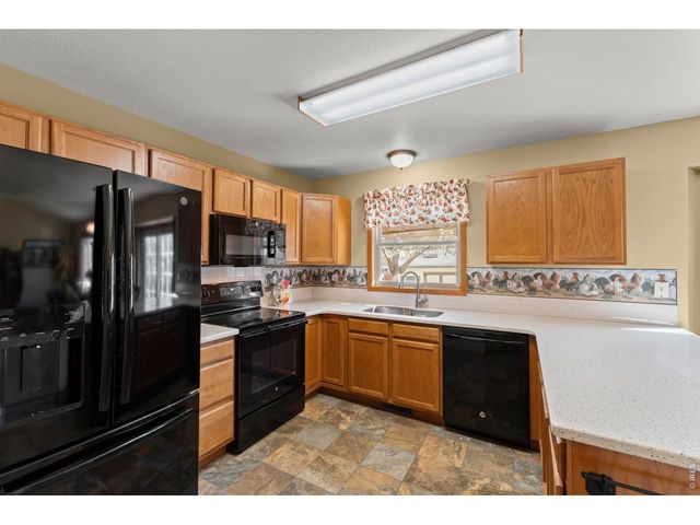 302 E 40th St, Loveland, CO 80538