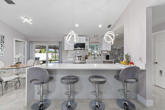 2471 SE Leithgow Street, Port St Lucie, FL 34952