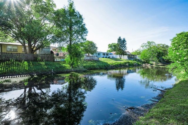 3011 SHADOW OAKS DRIVE, Holiday, FL 34690