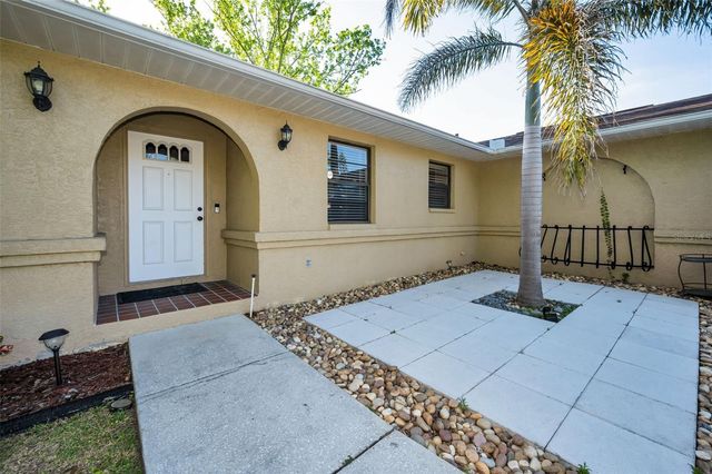 3011 SHADOW OAKS DRIVE, Holiday, FL 34690