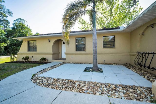 3011 SHADOW OAKS DRIVE, Holiday, FL 34690