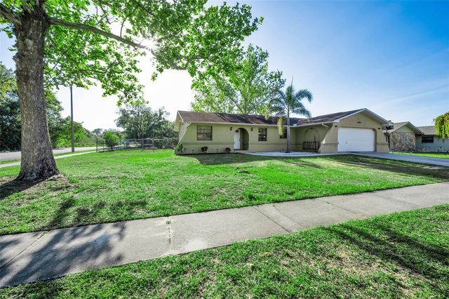 3011 SHADOW OAKS DRIVE, Holiday, FL 34690