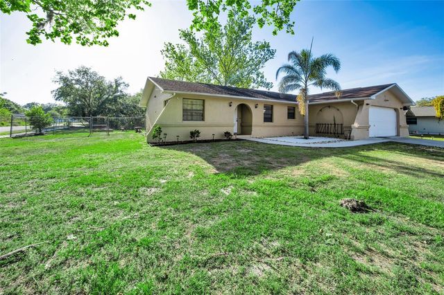 3011 SHADOW OAKS DRIVE, Holiday, FL 34690