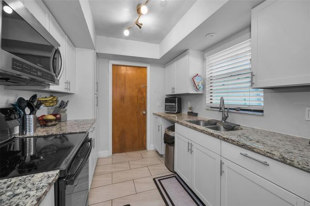 3011 SHADOW OAKS DRIVE, Holiday, FL 34690