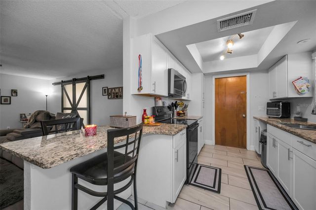 3011 SHADOW OAKS DRIVE, Holiday, FL 34690