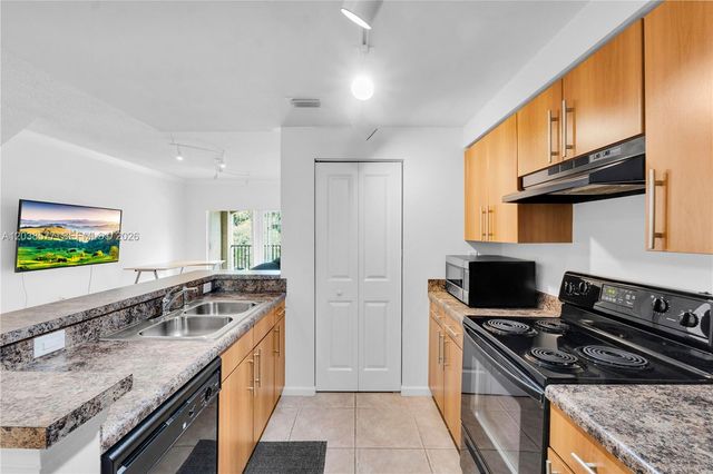 5880 W Sample Road 203, Coral Springs, FL 33067