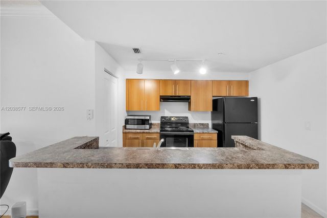 5880 W Sample Road 203, Coral Springs, FL 33067