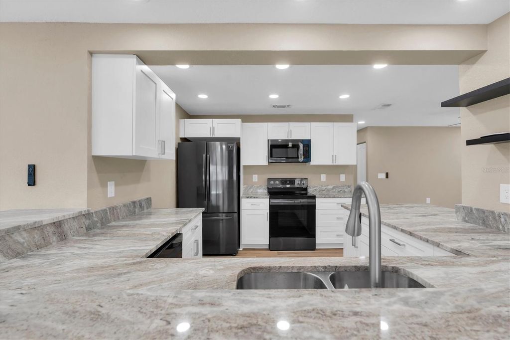 Image 16 of property listing at 10531 MEADOW HILL DRIVE, Port Richey, FL 34668