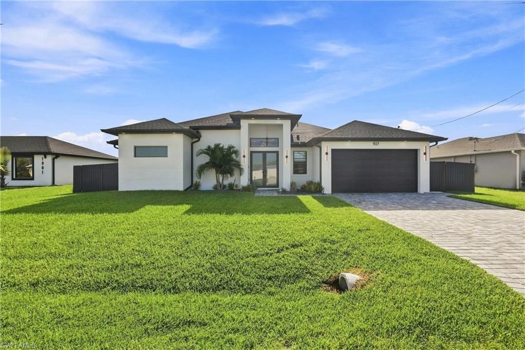 927 NE 13th PL, CAPE CORAL, FL 33909 — photo 2