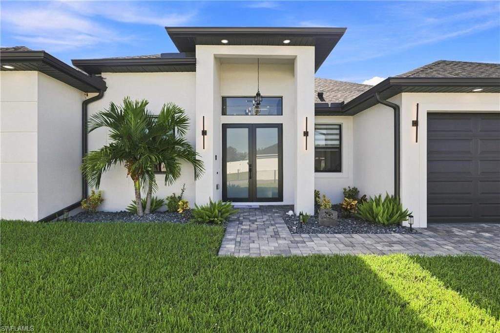 927 NE 13th PL, CAPE CORAL, FL 33909 — photo 3
