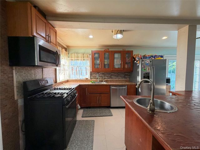 431 Blue Point Road, Farmingville, NY 11738
