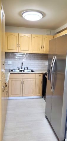 100 Village Green Circle E 112, Palm Springs, FL 33461