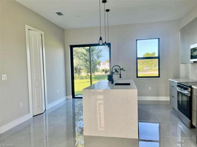 56 Floyd AVE S, Lehigh Acres, FL 33976