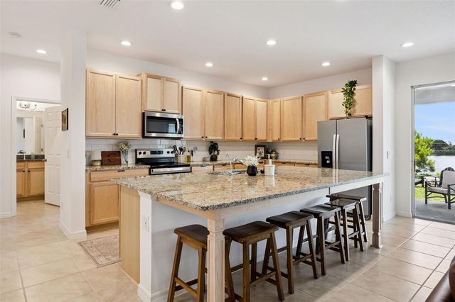 7114 ROLLING LEAF ROAD, Groveland, FL 34736