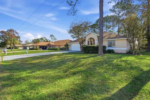 100 WESTBURY LANE, Palm Coast, FL 32164