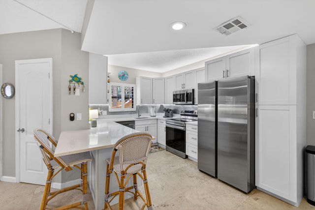 44 Uno Lago Drive, North Palm Beach, FL 33408