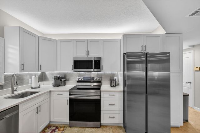 44 Uno Lago Drive, North Palm Beach, FL 33408