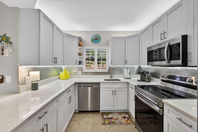 44 Uno Lago Drive, North Palm Beach, FL 33408