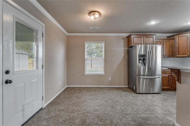 301 Woodcreek Street, Lowell, AR 72745