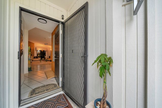 6062 Bania Wood Circle, Atlantis, FL 33462