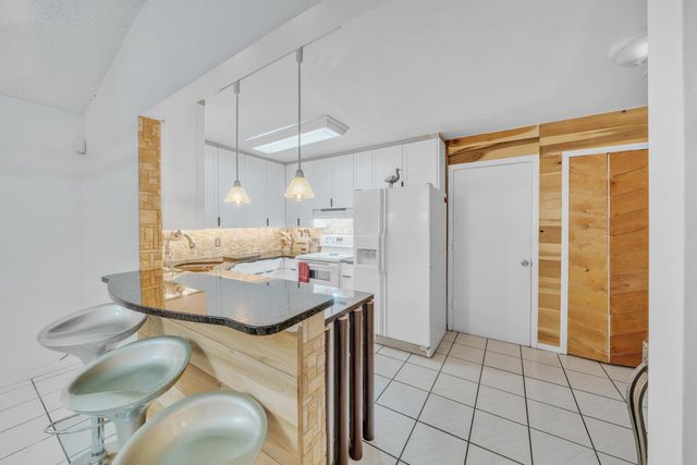 6062 Bania Wood Circle, Atlantis, FL 33462