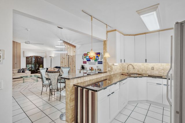 6062 Bania Wood Circle, Atlantis, FL 33462