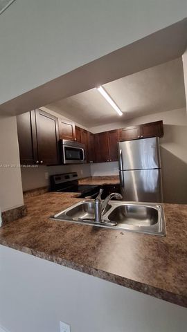 496 NW 165th St Road D612, Miami, FL 33169