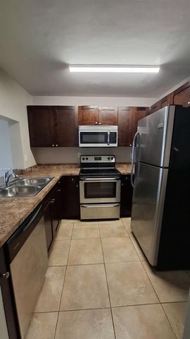 496 NW 165th St Road D612, Miami, FL 33169