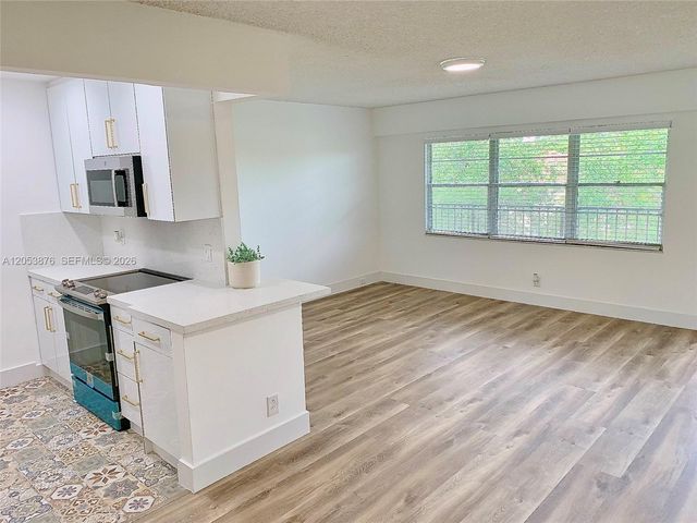 101 SW 132nd Way 413J, Pembroke Pines, FL 33027