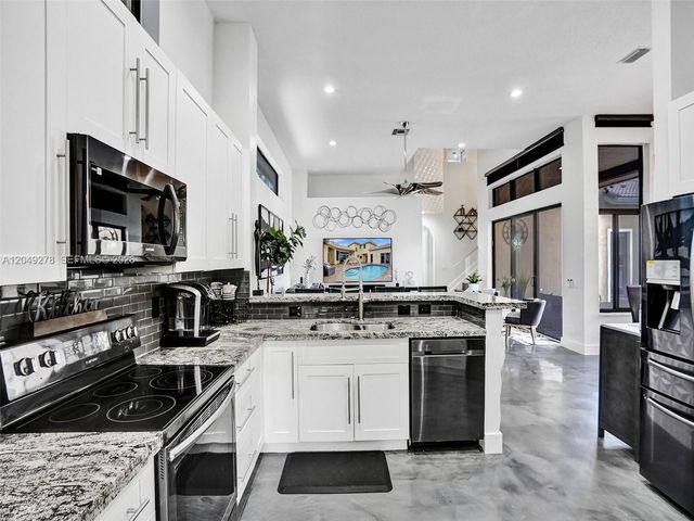 303 NW 119th Dr, Coral Springs, FL 33071
