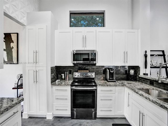 303 NW 119th Dr, Coral Springs, FL 33071