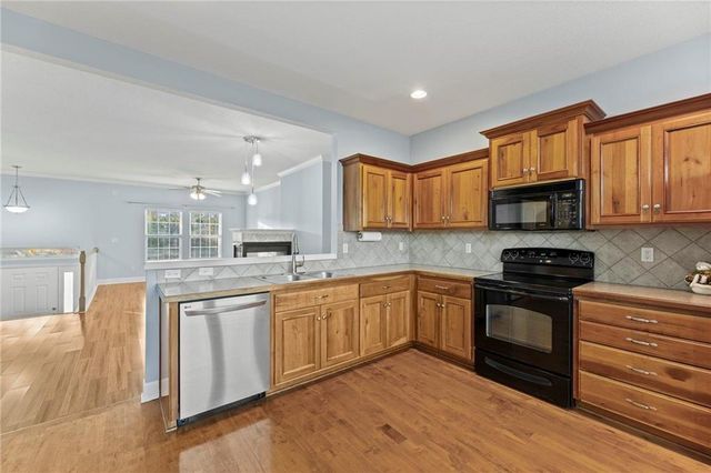 11173 S Woodsonia Drive, Olathe, KS 66062