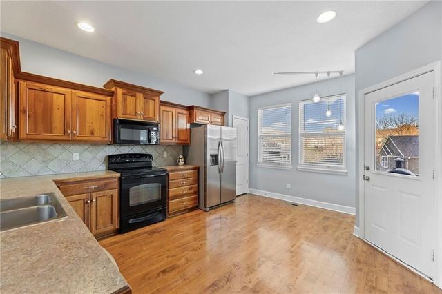 11173 S Woodsonia Drive, Olathe, KS 66062