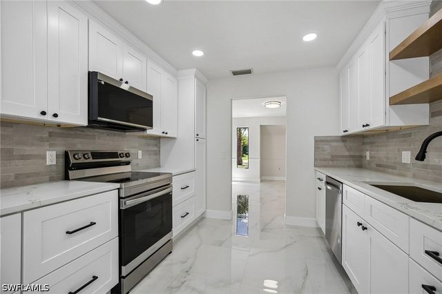 1928 SW 8th CT, Cape Coral, FL 33991