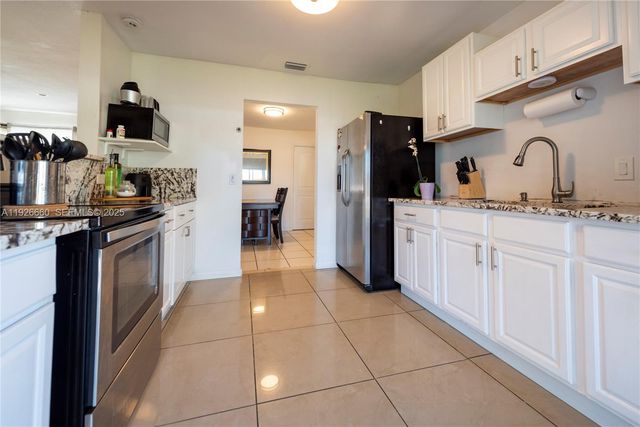 9331 NW 24th Pl, Sunrise, FL 33322