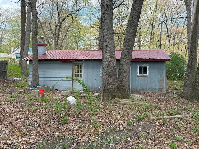 1031 Pocahontas Trail, Harrison, MI 48625