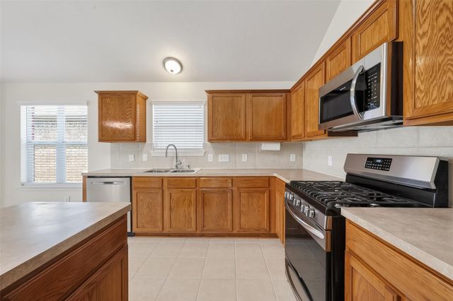 9830 Lynette Falls Drive, Houston, TX 77095